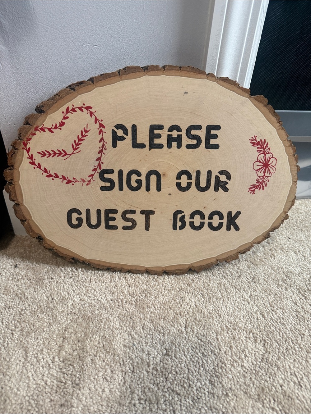 Rustic Wood Slice Guest Book Sign with Red Floral Accents